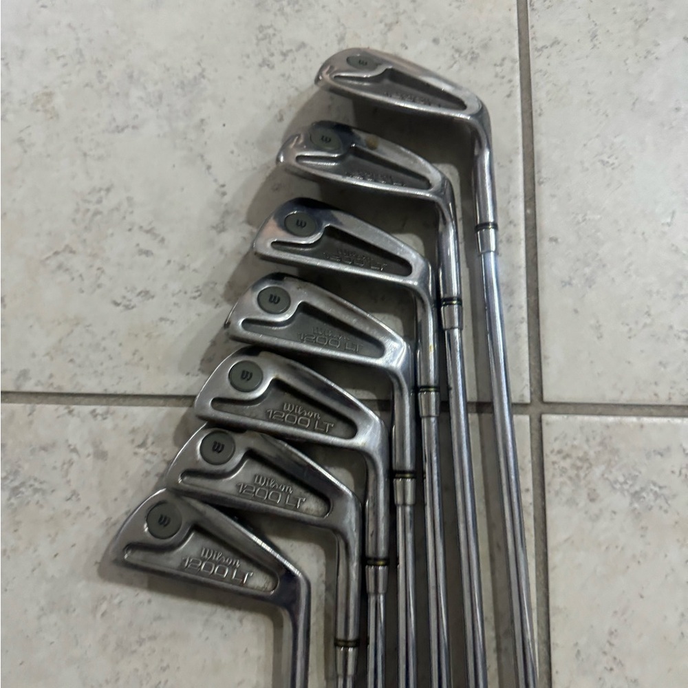 Wilson 1200 LT itons 3/9 in right handed 
Steel shafts 
Used conditions